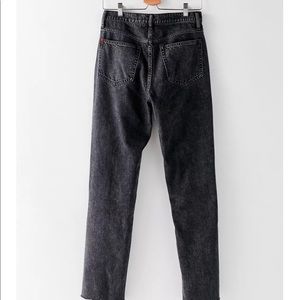 BDG Black distressed straight leg jeans.